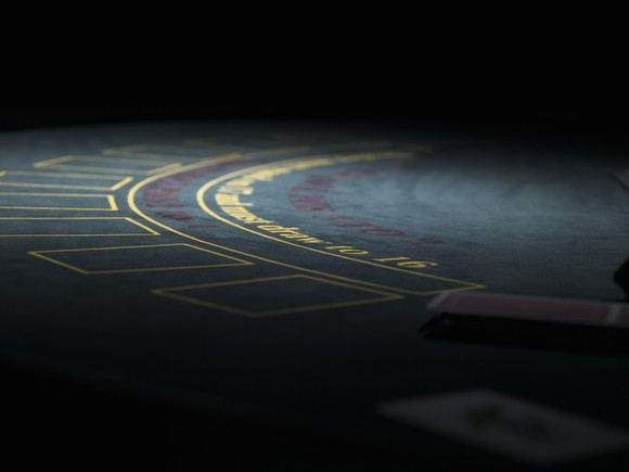 Darkened casino table game