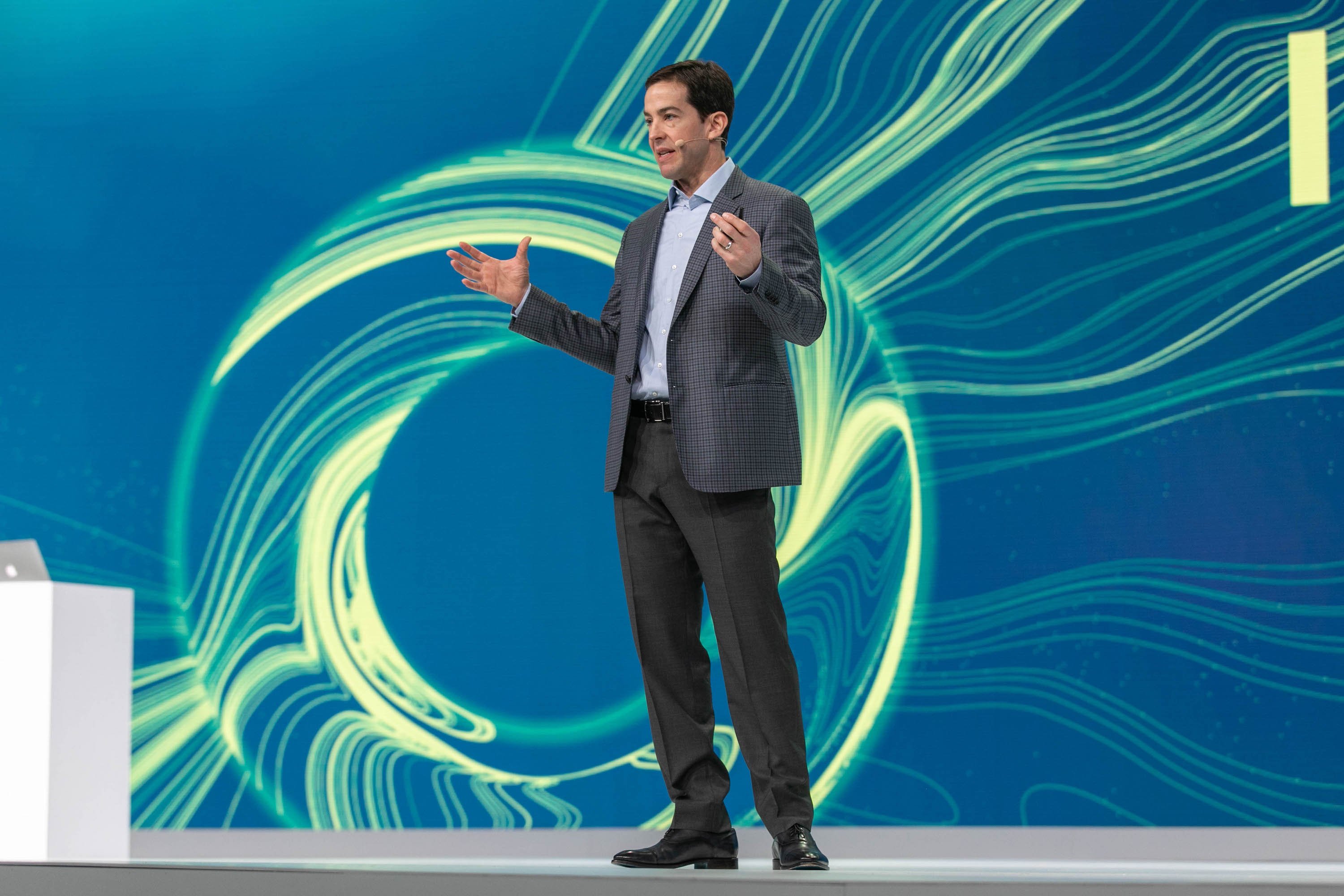 Todd McKinnon speaking on a stage