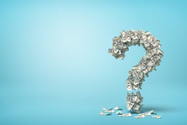Question mark made of cash