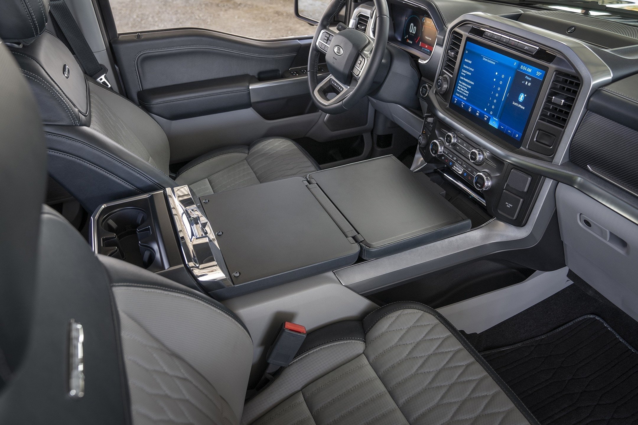 The front seat and dashboard of a 2021 Ford F-150 pickup. 