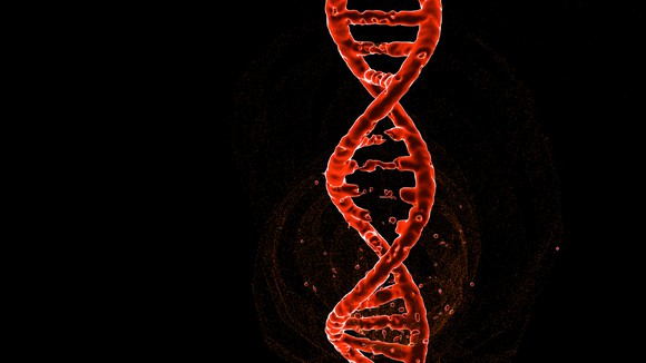 Red DNA double helix with a black background