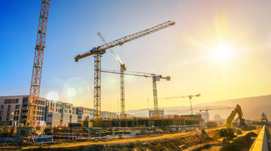 Construction Site with Operating Equipment