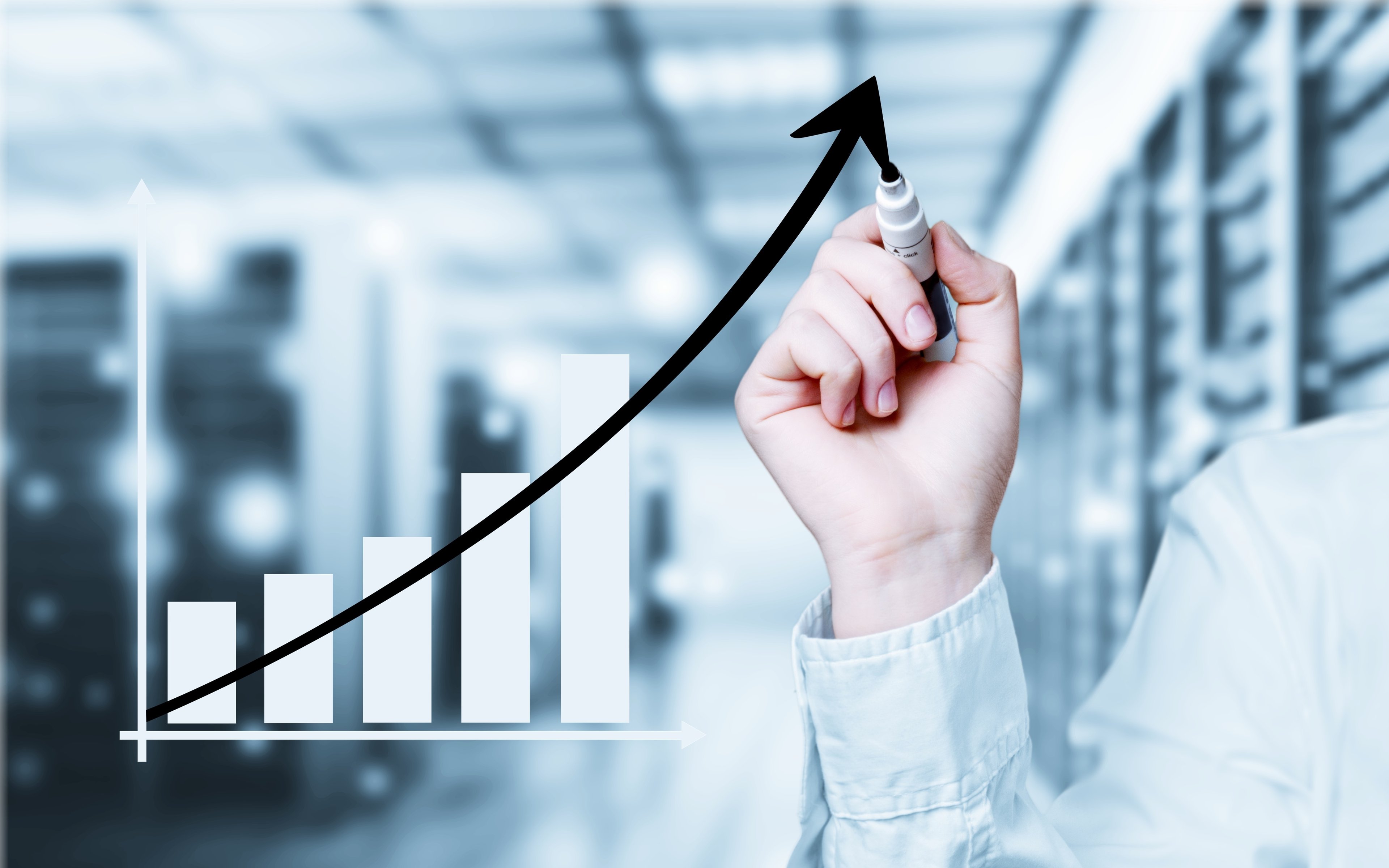 Man drawing a growth trajectory. 