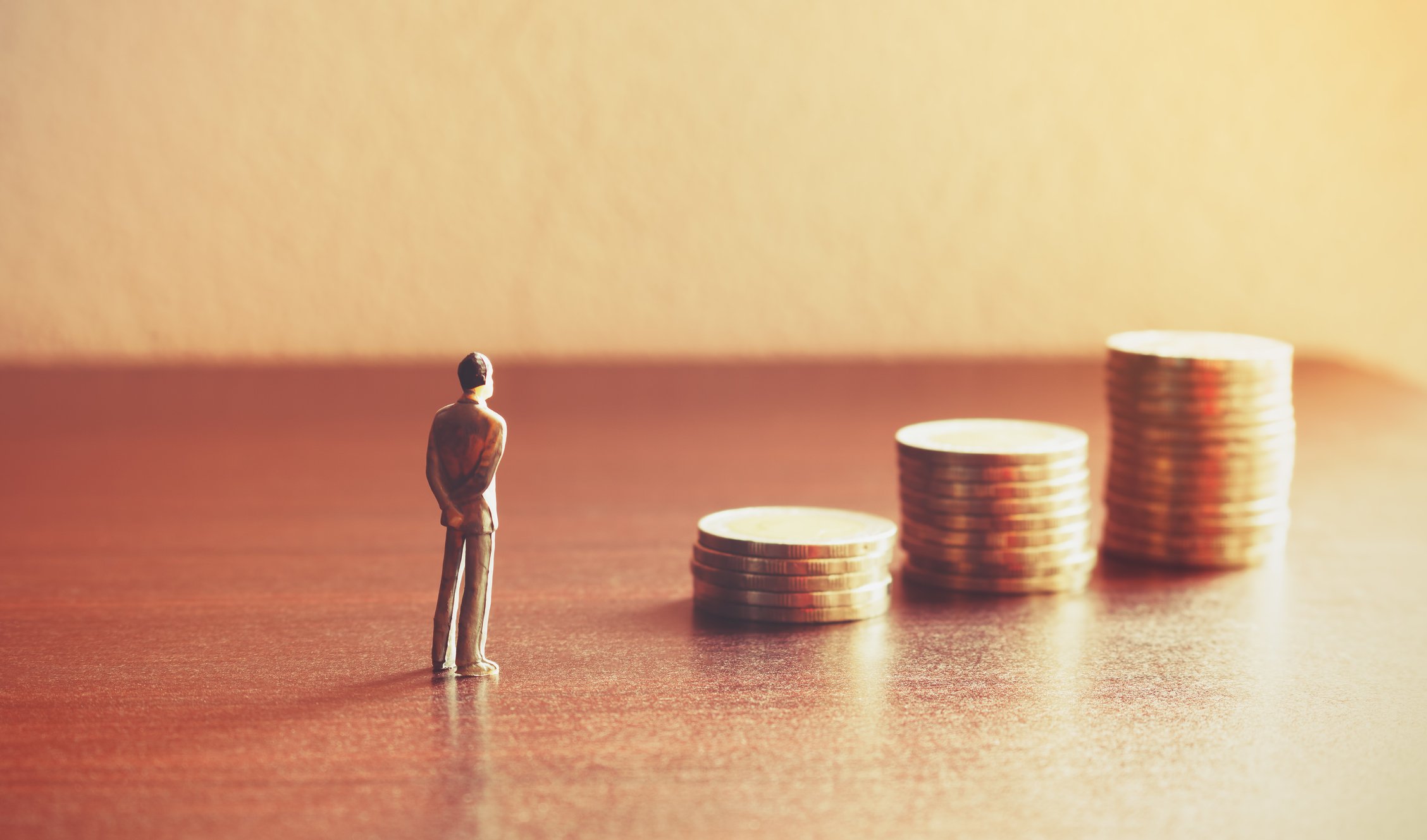 A man facing rising money. 
