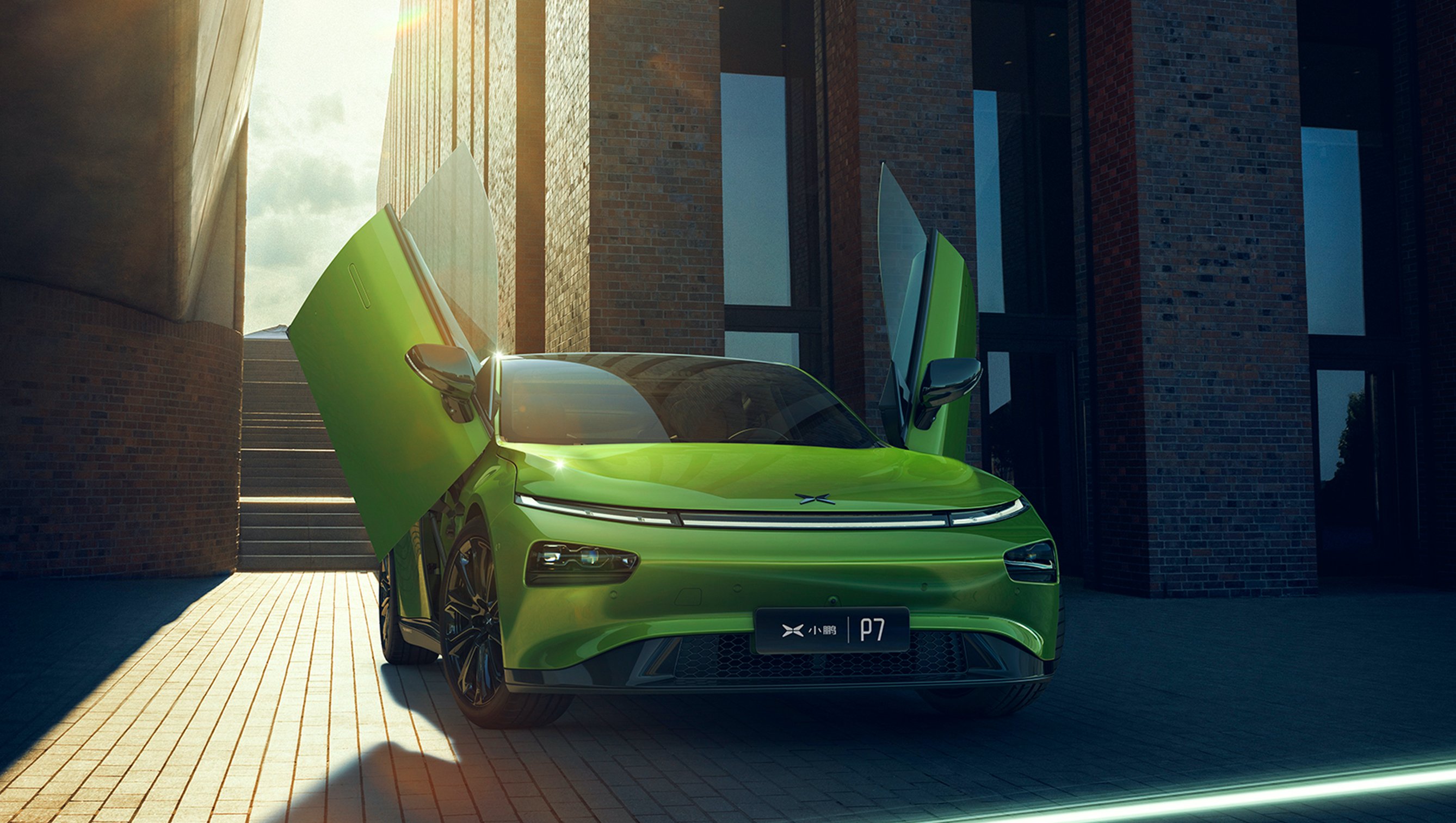 A bright green Xpeng P7 sedan in limited-edition "Wing" trim, with Lamborghini-like doors. 