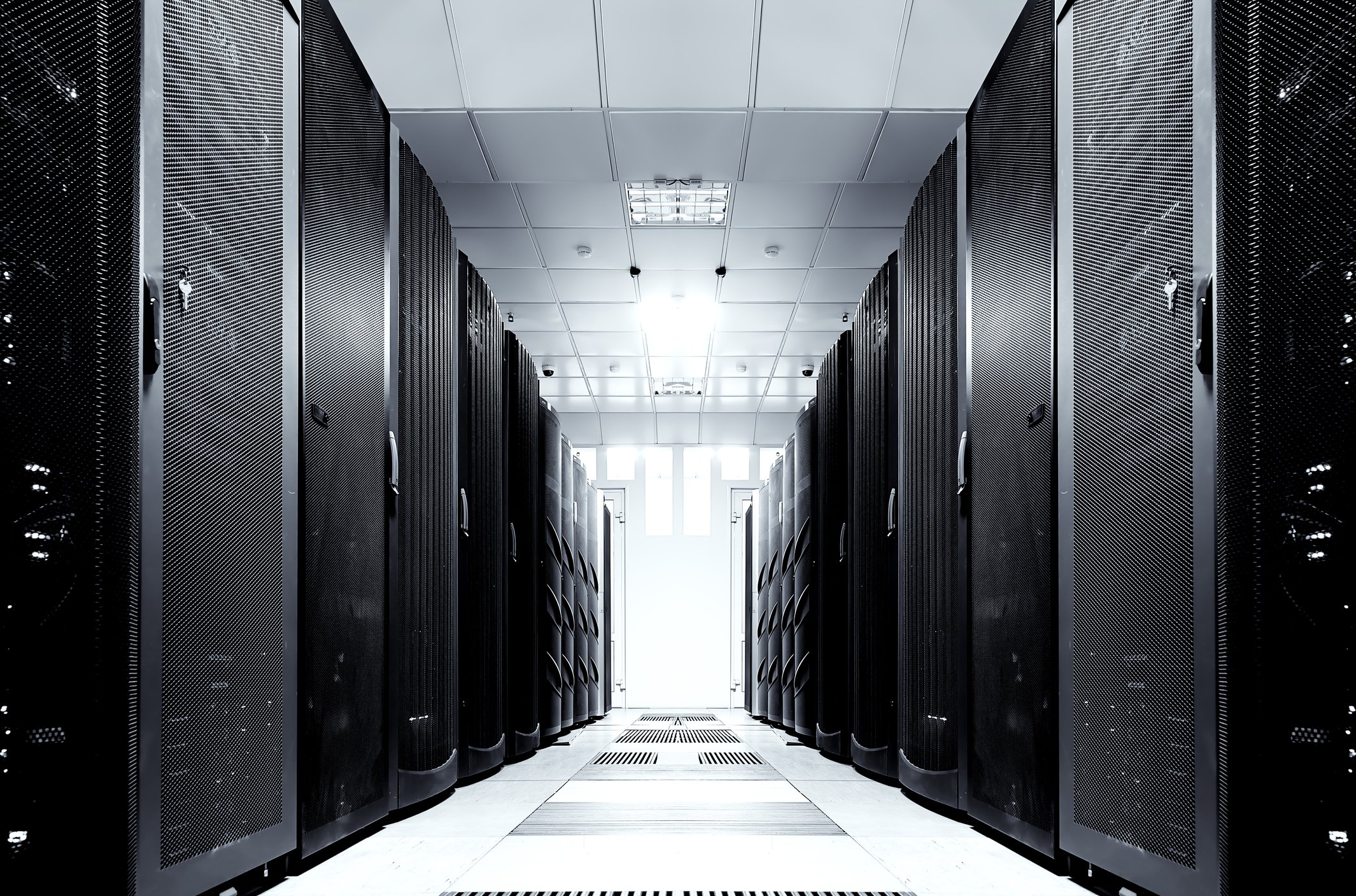A server room with a white floor.