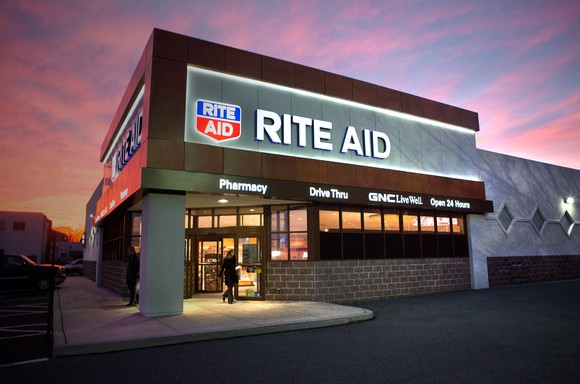 A Rite Aid store at twilight.