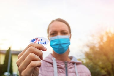 11_masked_woman_i_voted_sticker.original