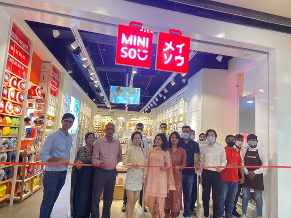 A ribbon-cutting at a Miniso store