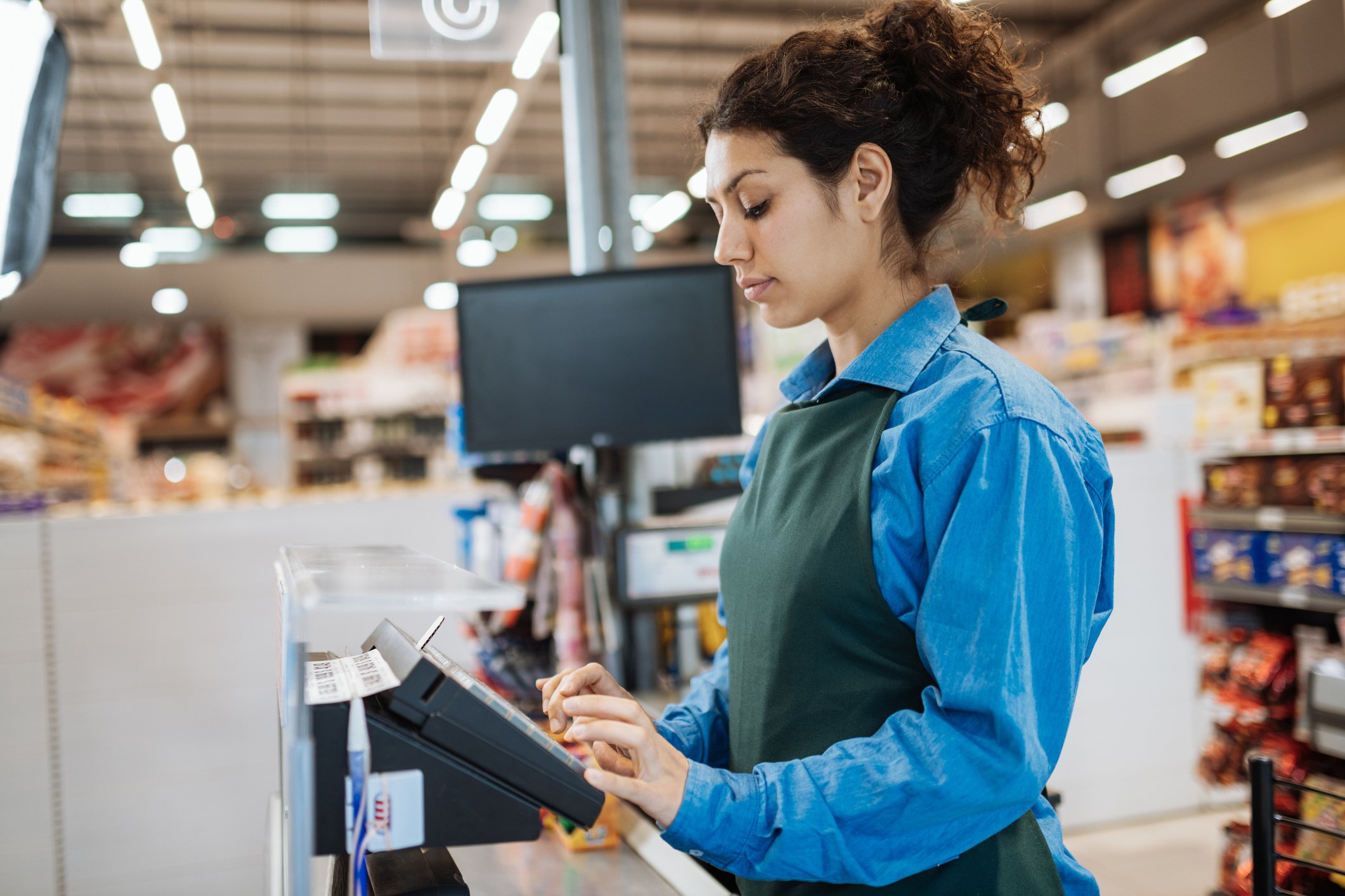 Female supermarket cashier