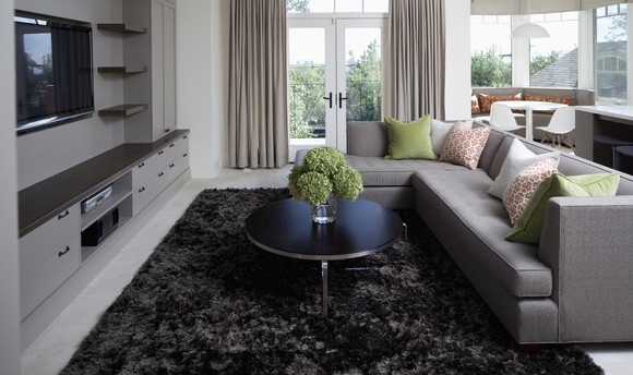 A sectional couch in a living room