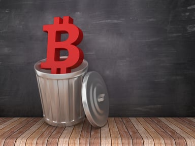 Bitcoin symbol in trash can