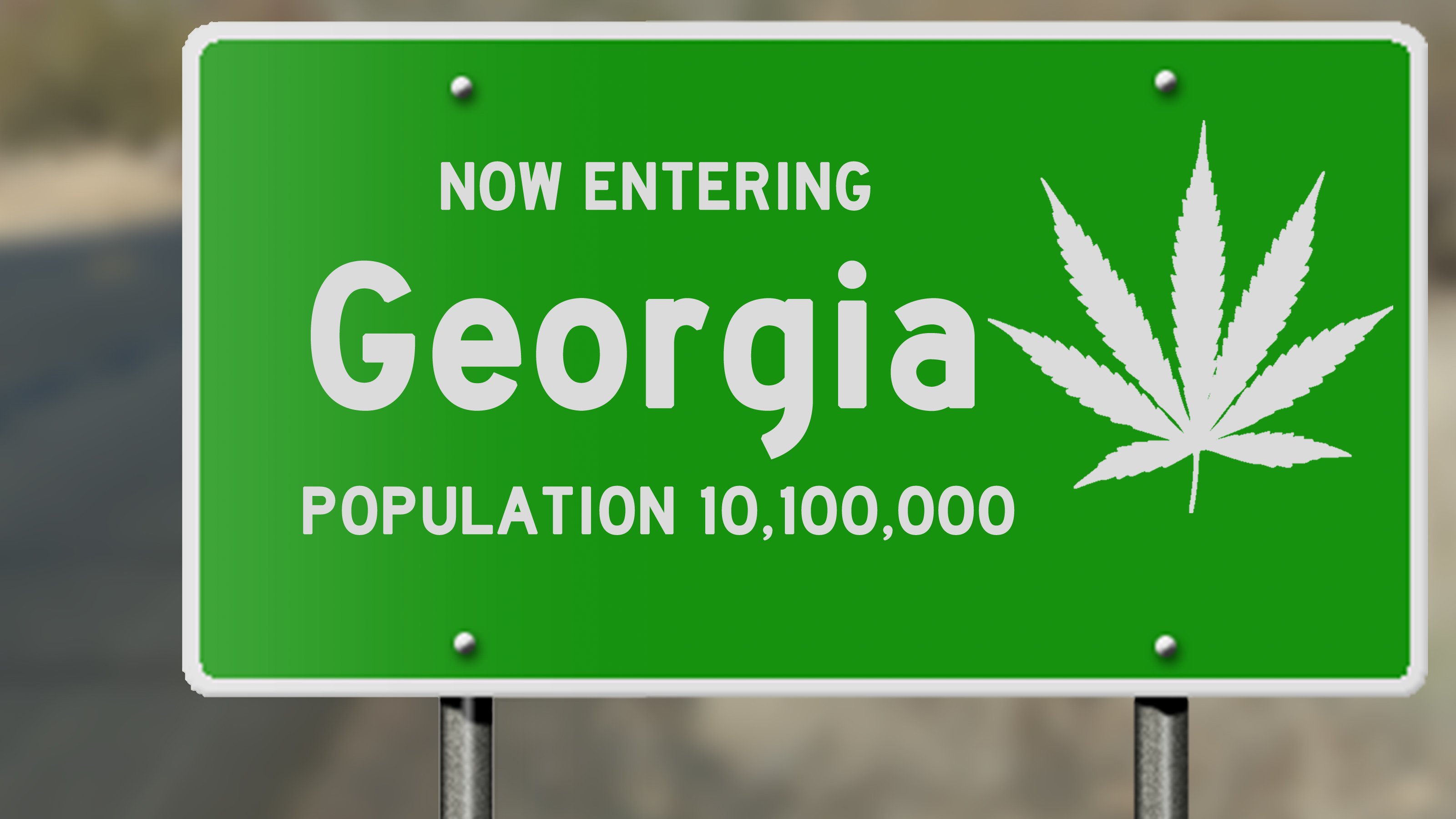 "Now entering Georgia" sign with a cannabis leaf printed on it