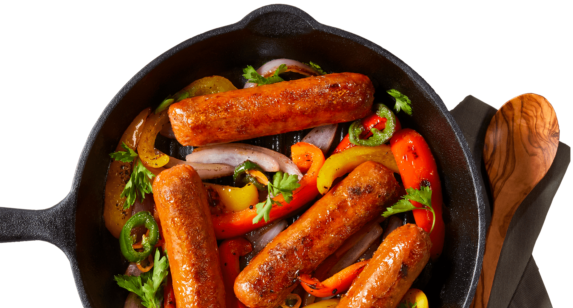 Sausages and peppers in a frying pan