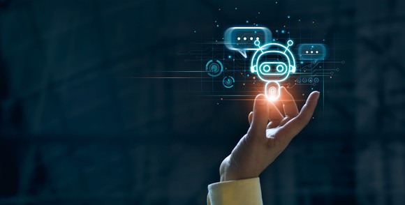 A person holding a robot icon.