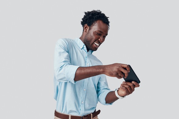 Man playing game on phone