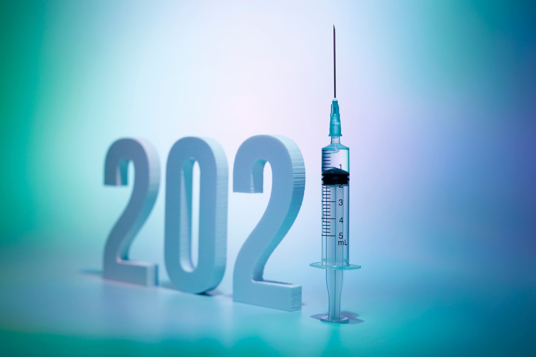 The year "2021" is written, with a syringe as the "1."