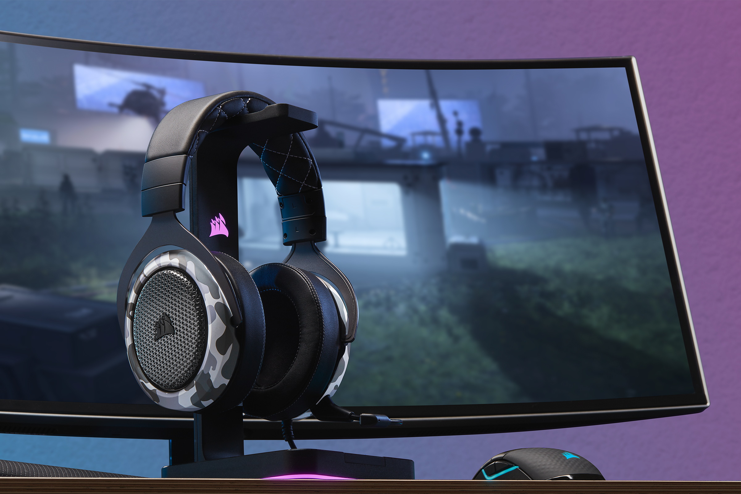 Corsair headset in front of a PC