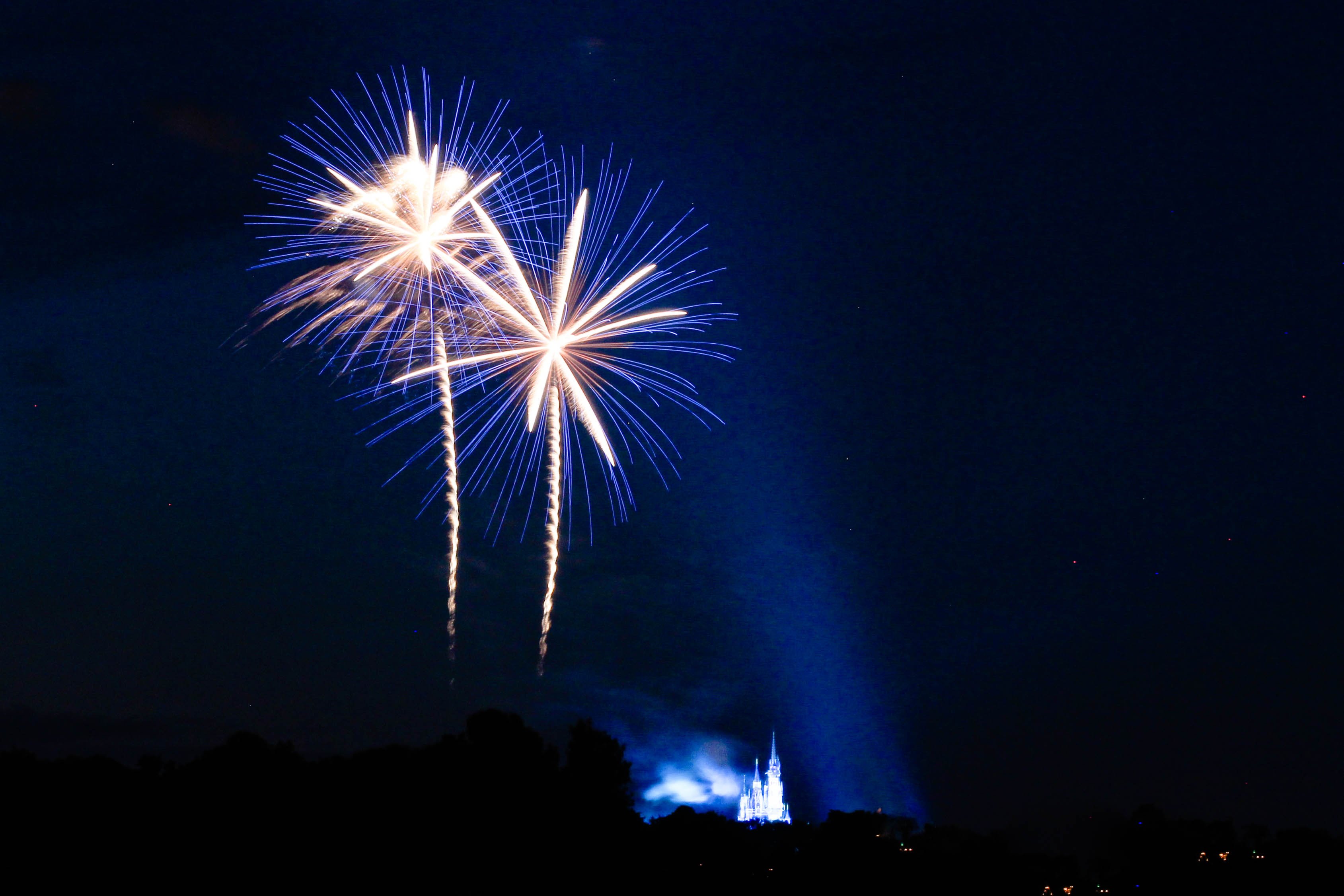 A fireworks display at a Disney theme park