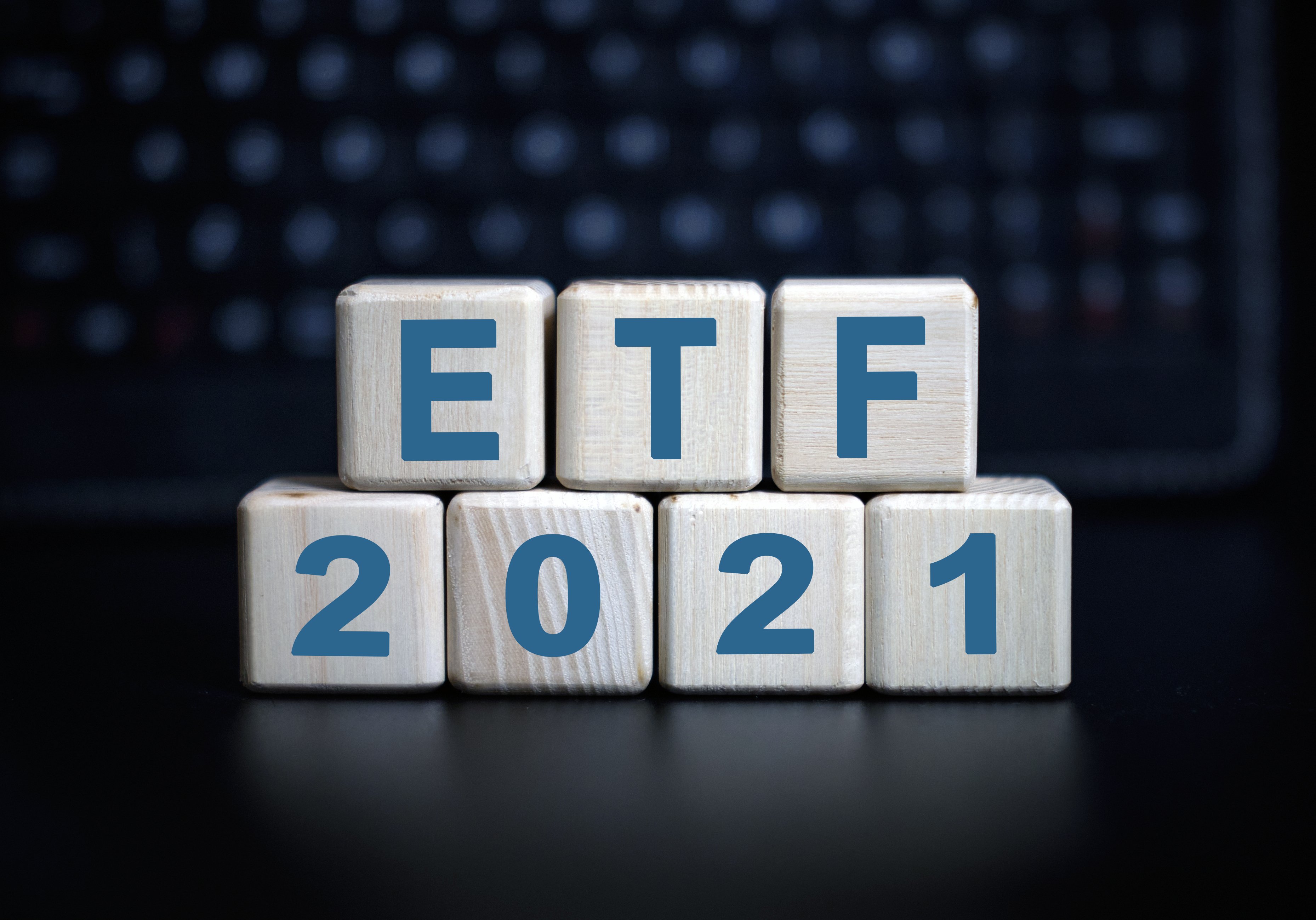 Blocks with the letters ETF on them as well as 2021. The ETF blocks are on top of the 2021 blocks.