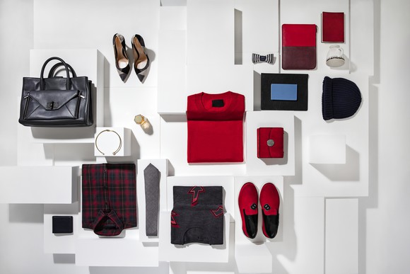 A handbag, shoes, and other fashion items on display. 