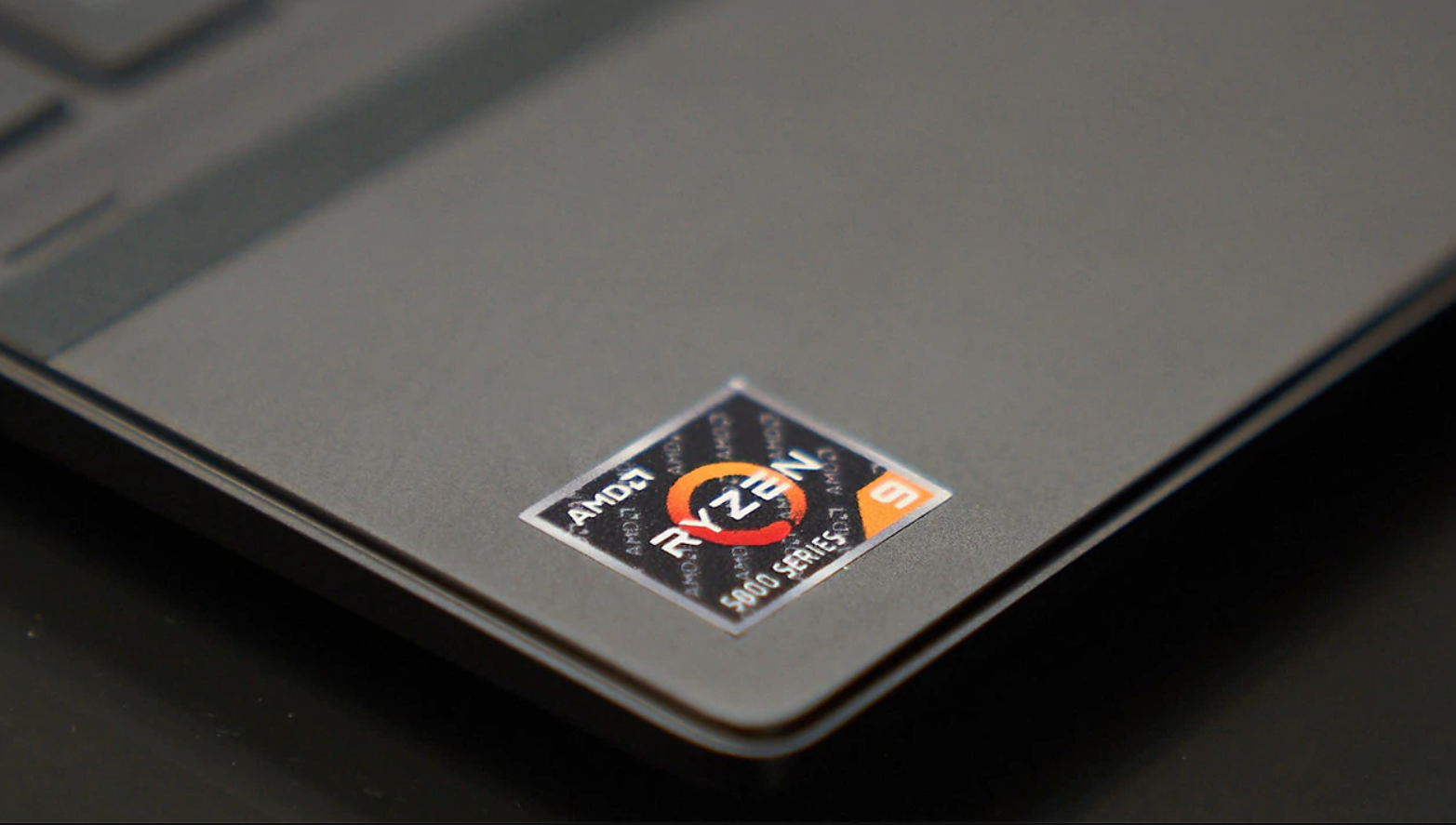 A Ryzen sticker on a laptop.