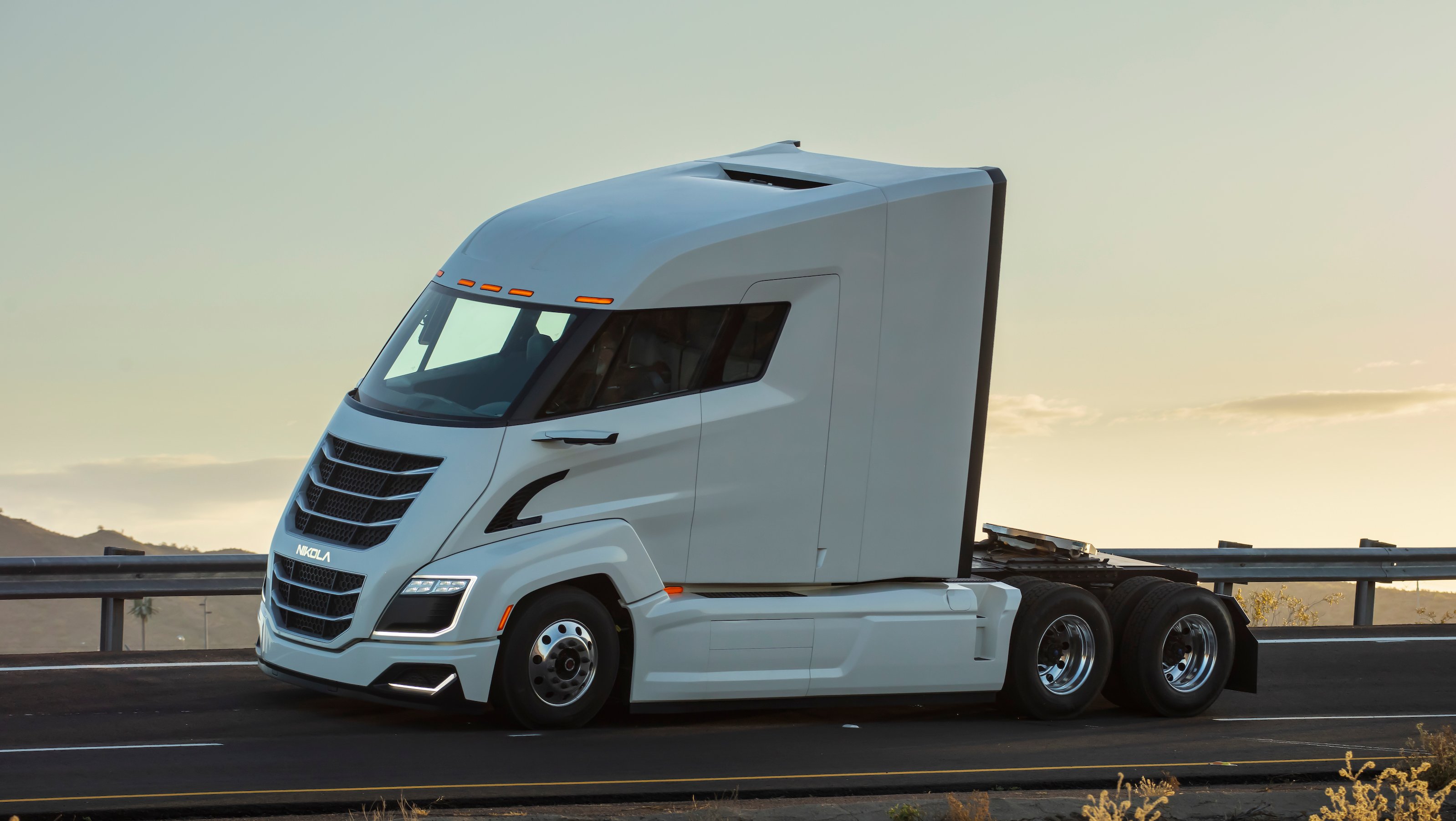 A white Nikola Two, an electric semitruck powered by a hydrogen fuel cell.