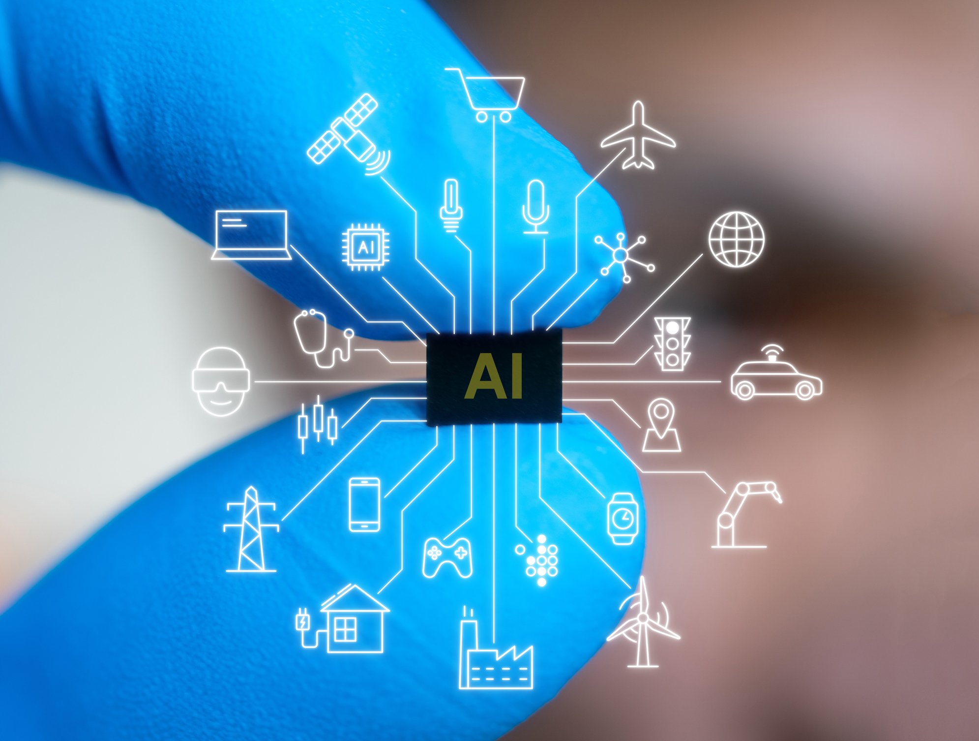 A tiny chip labeled AI held between two fingers of a technician. 