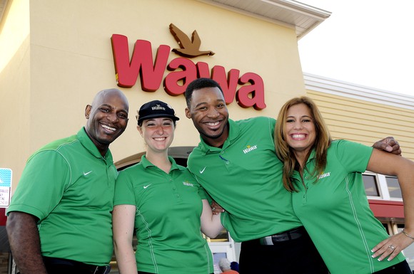 Wawa employees in front of store