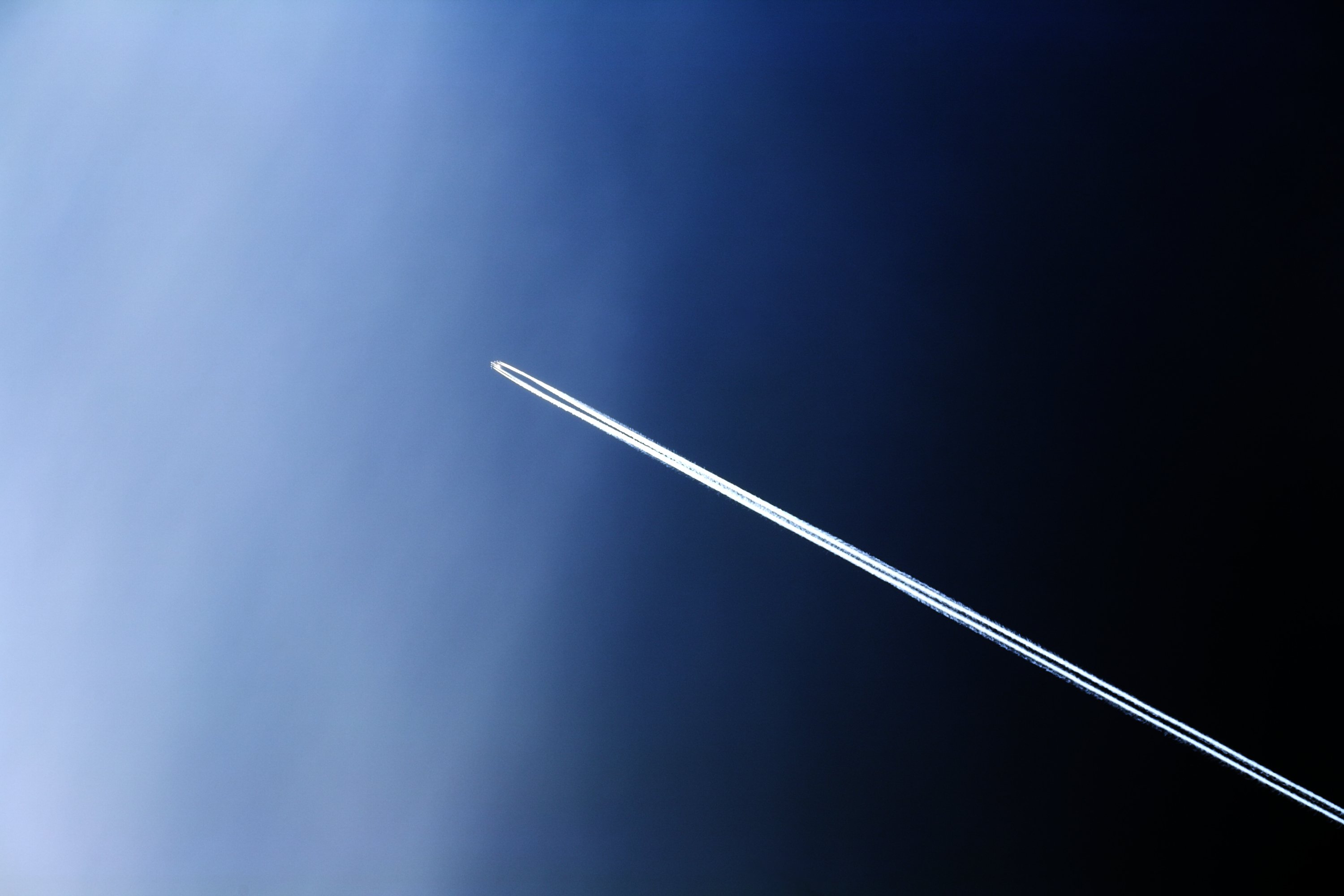 A rocket journeying into space.