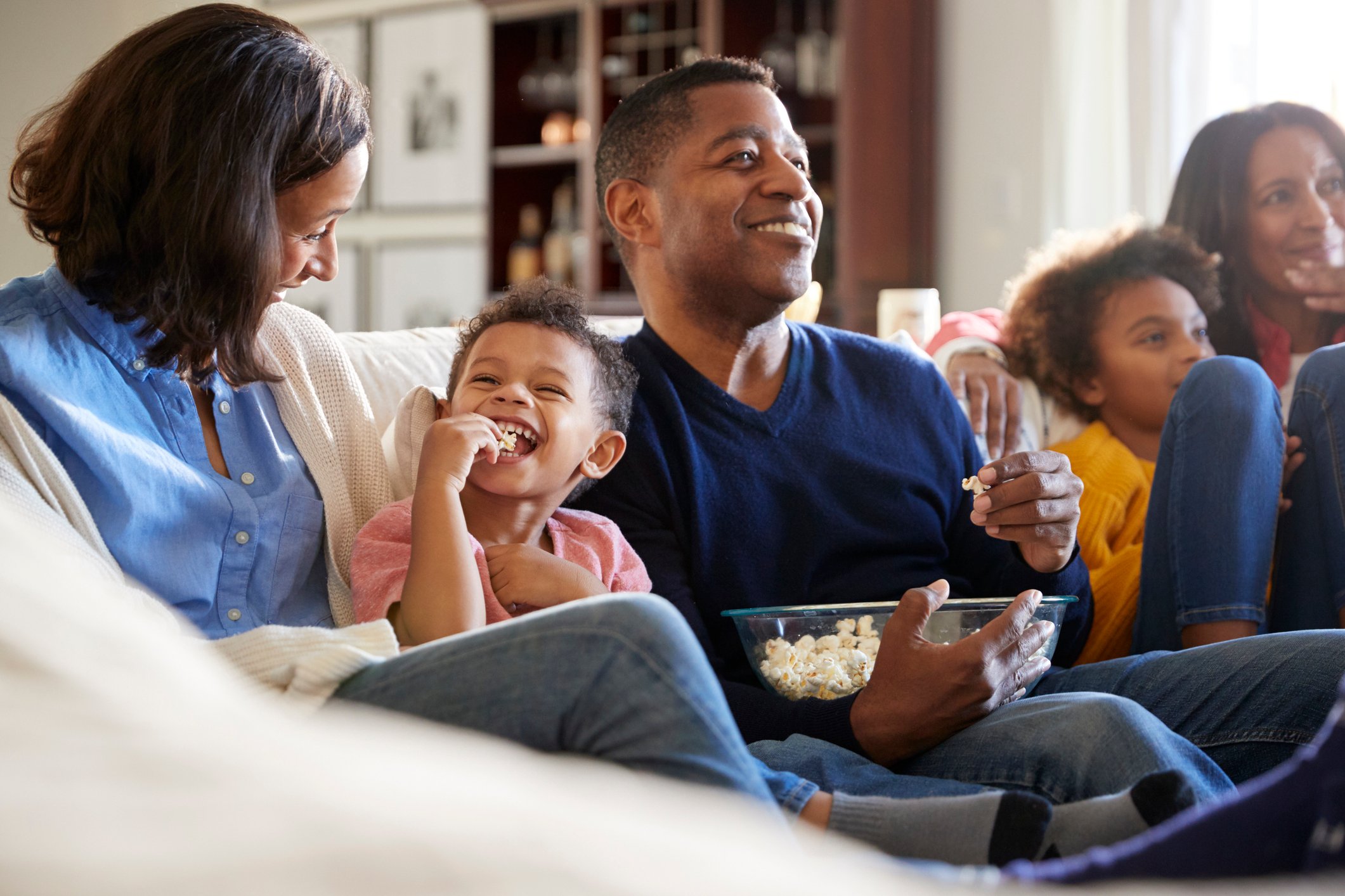 A family watching TV at home
