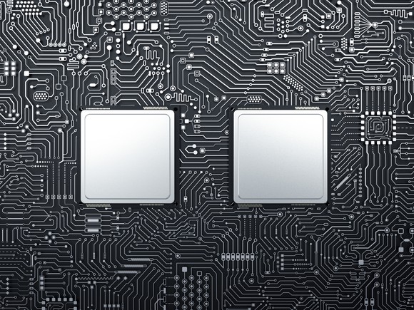 Two processors on a computer motherboard.