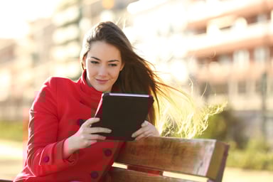 Fashionable woman using tablet