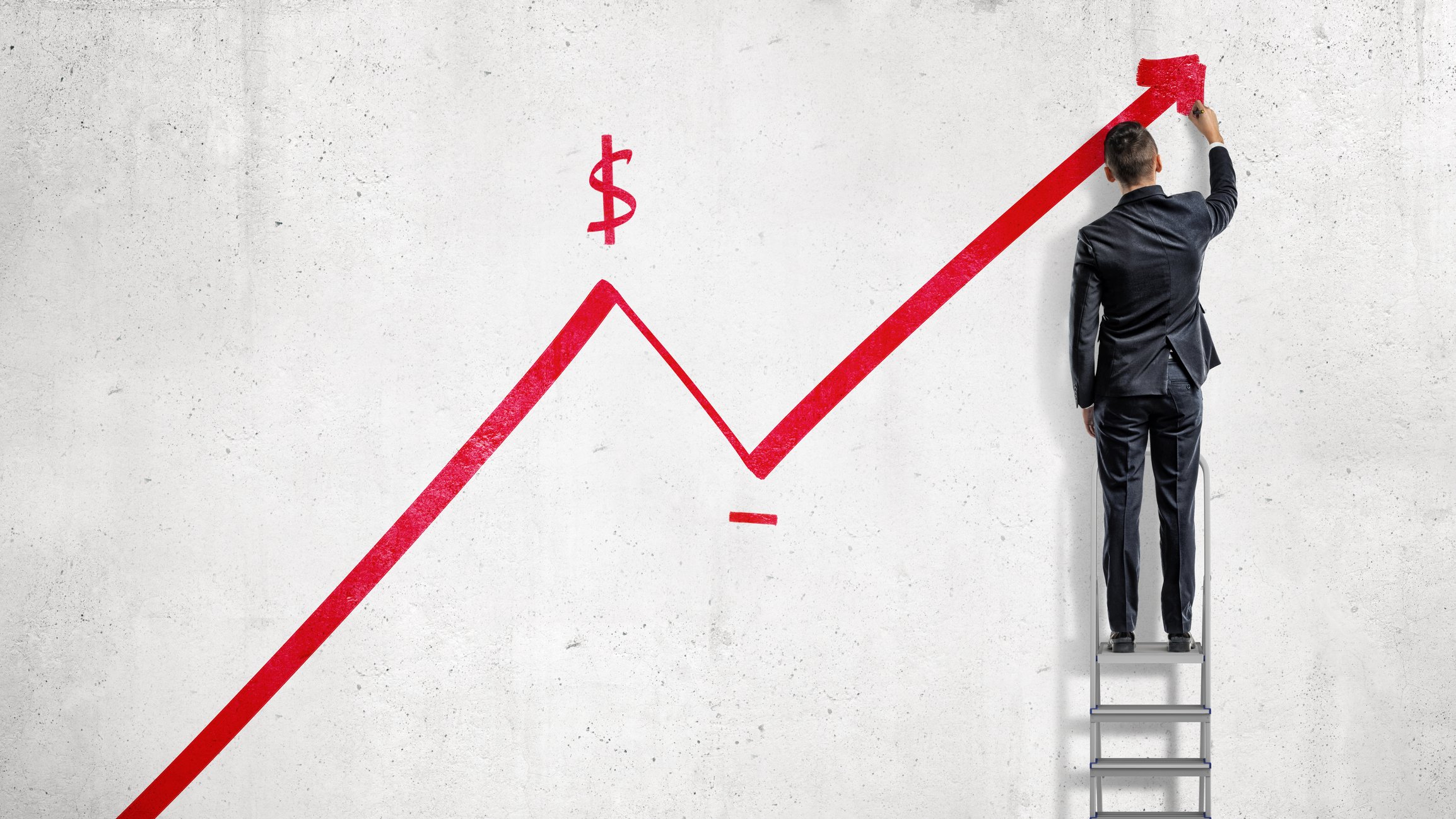 Red line with arrow trending up with a dollar sign drawn above the line and a man wearing a suit standing on a ladder holding his hand up to the arrow