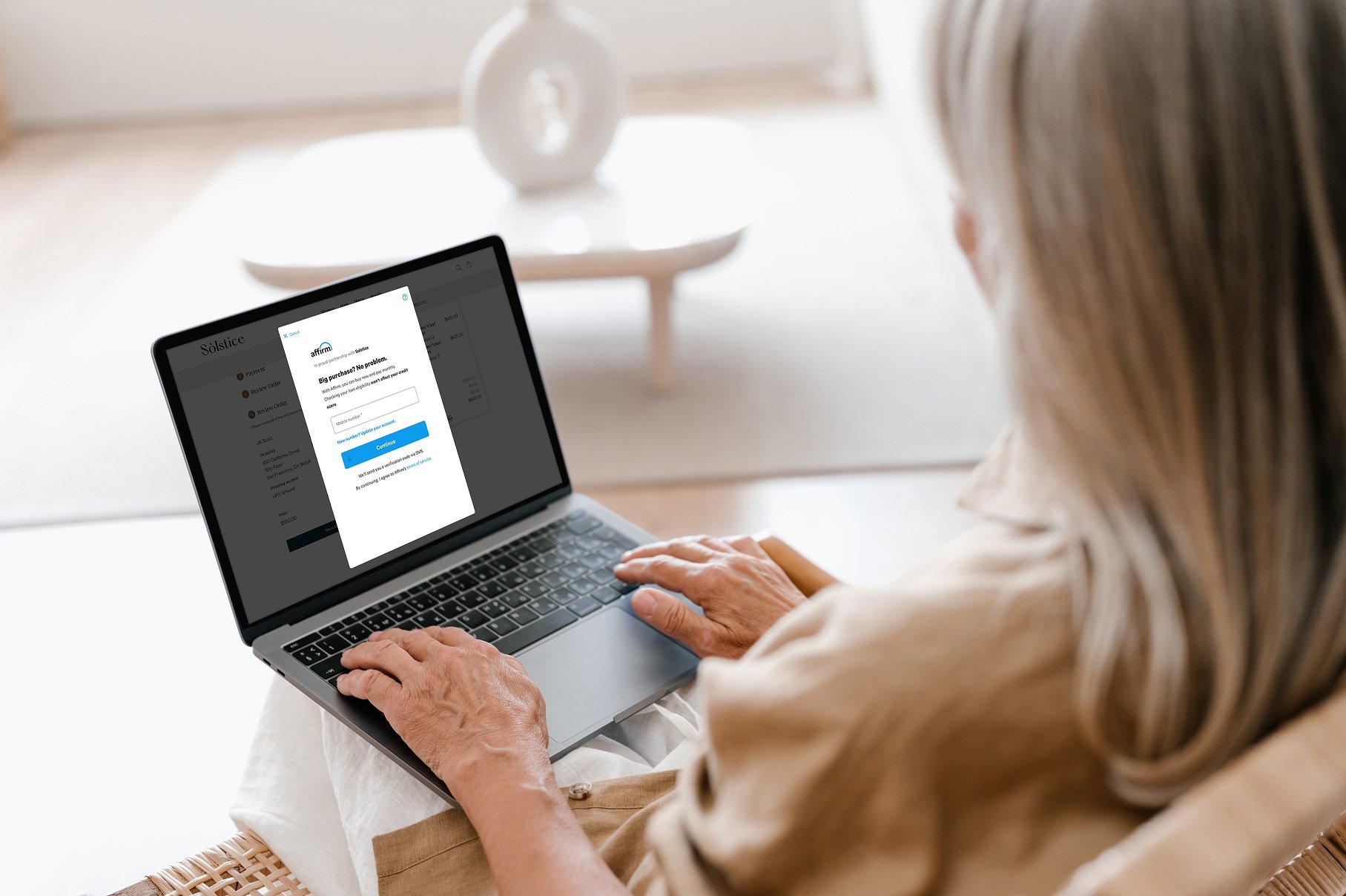 A woman purchasing a product with Affirm on a computer.