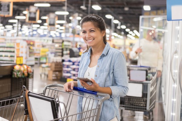 A woman shopping in a supermarket.