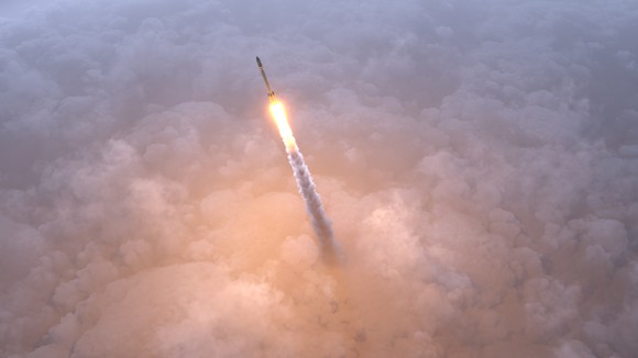 A rocket blasts off through the clouds. 