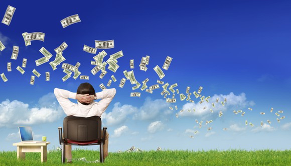 A man watching cash fly by.