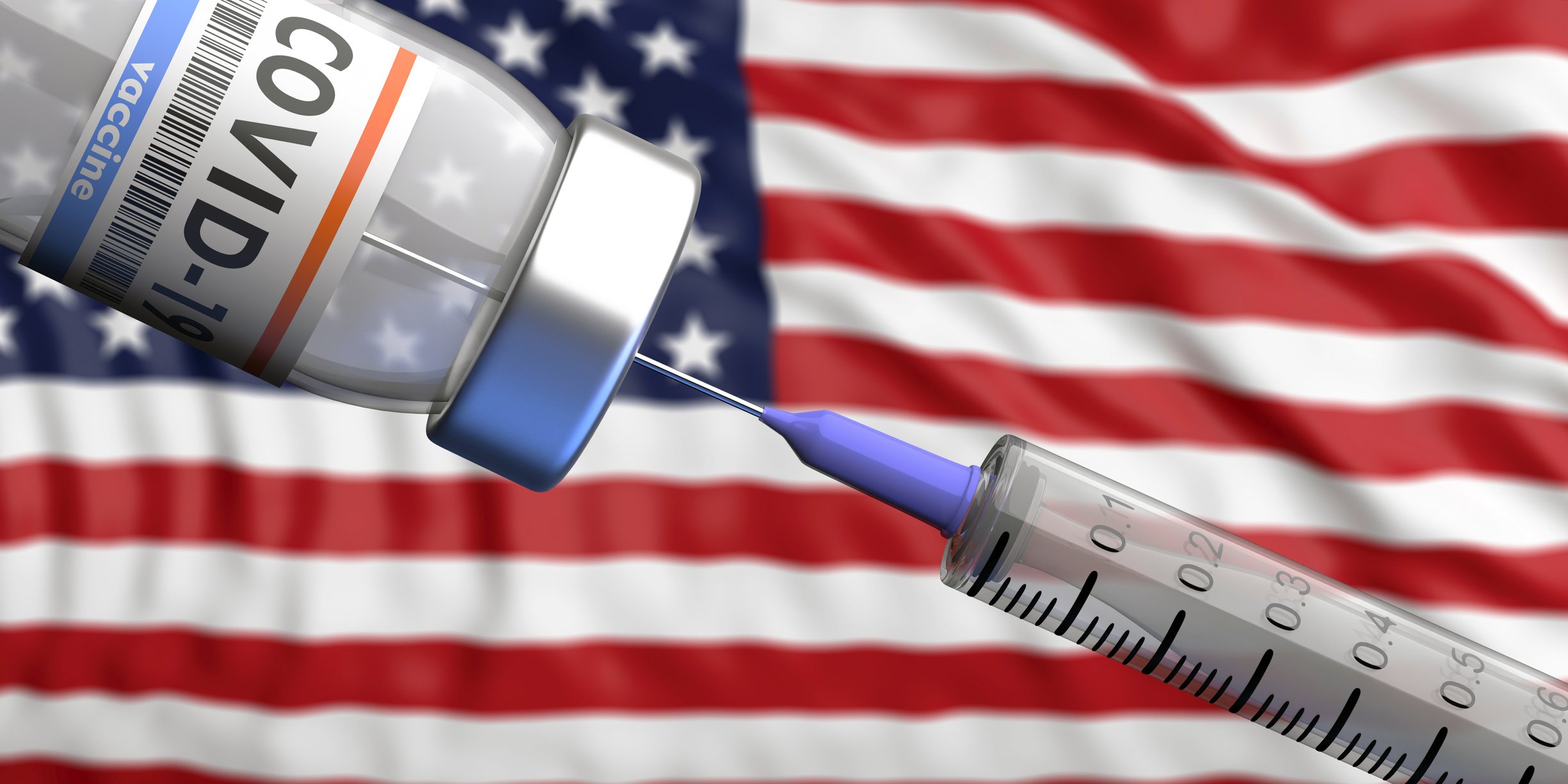 COVID-19 vaccine is drawn up in front of an American flag.