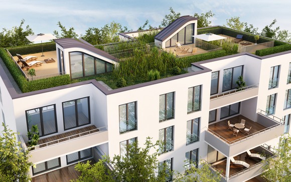 A modern apartment building with plants and foliage on the roof and decks. 