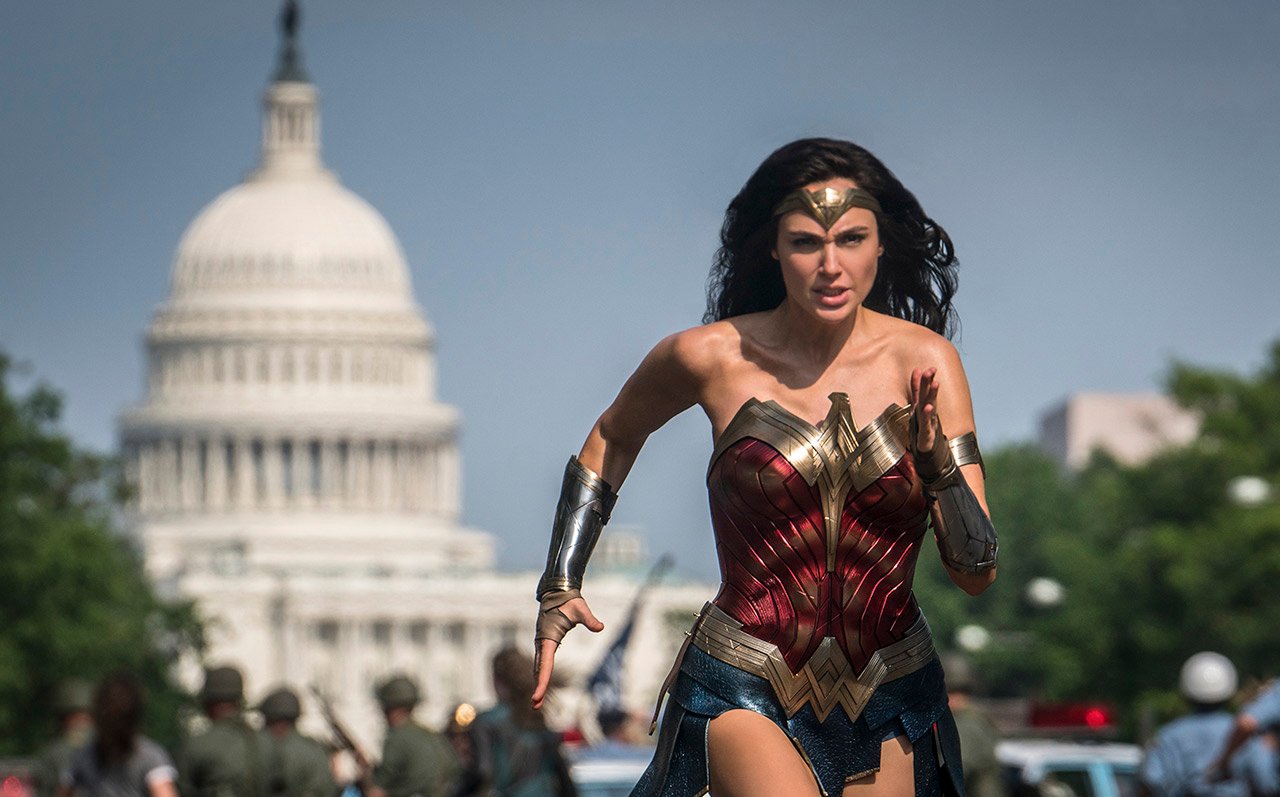 Wonder Woman running past Capitol