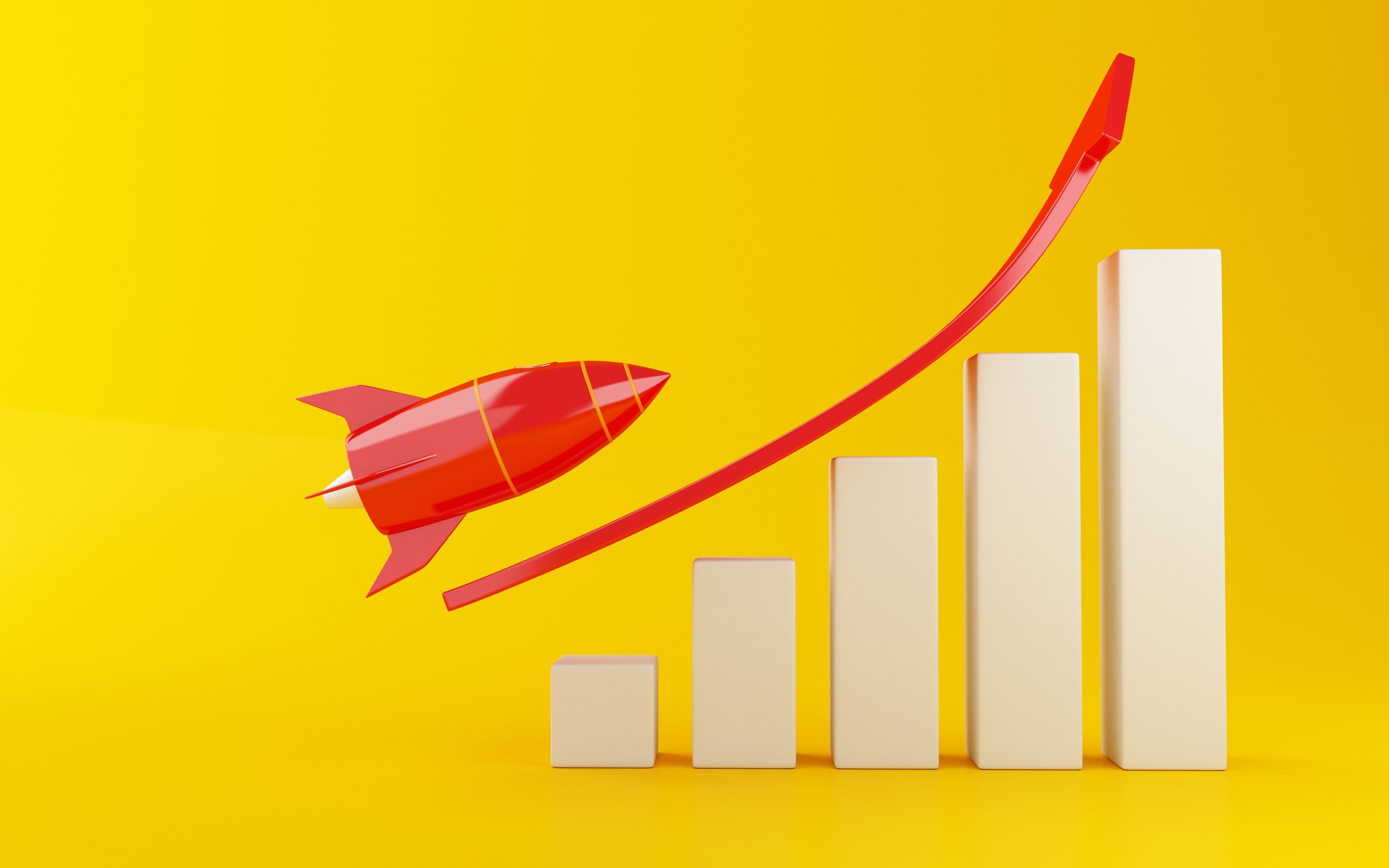A red rocket ship prepares to fly over a rising bar chart.