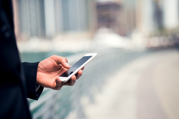 A person using a mobile phone.