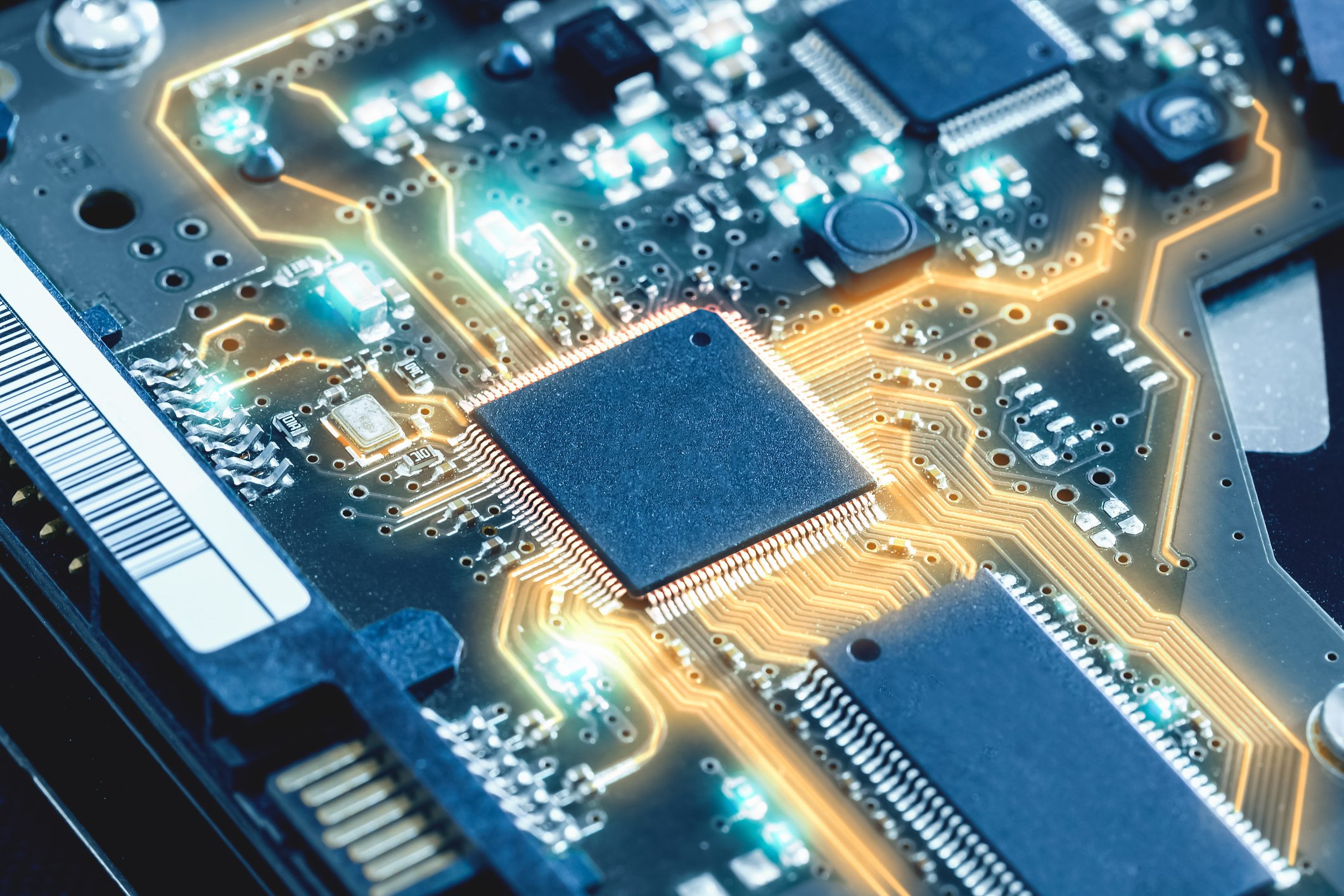 An electronic circuit board with electric currents coming out of a processor