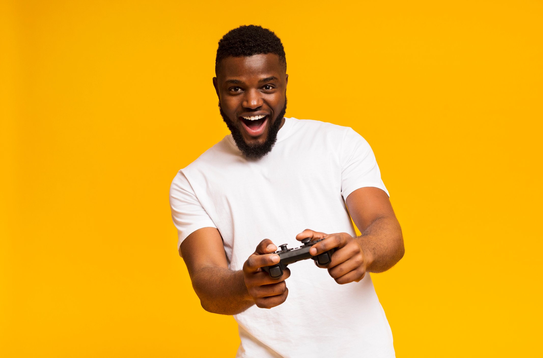A man holding a video game remote. 
