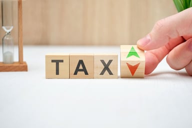 Tax concept with up and down arrows