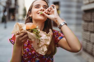 A woman eating a burger