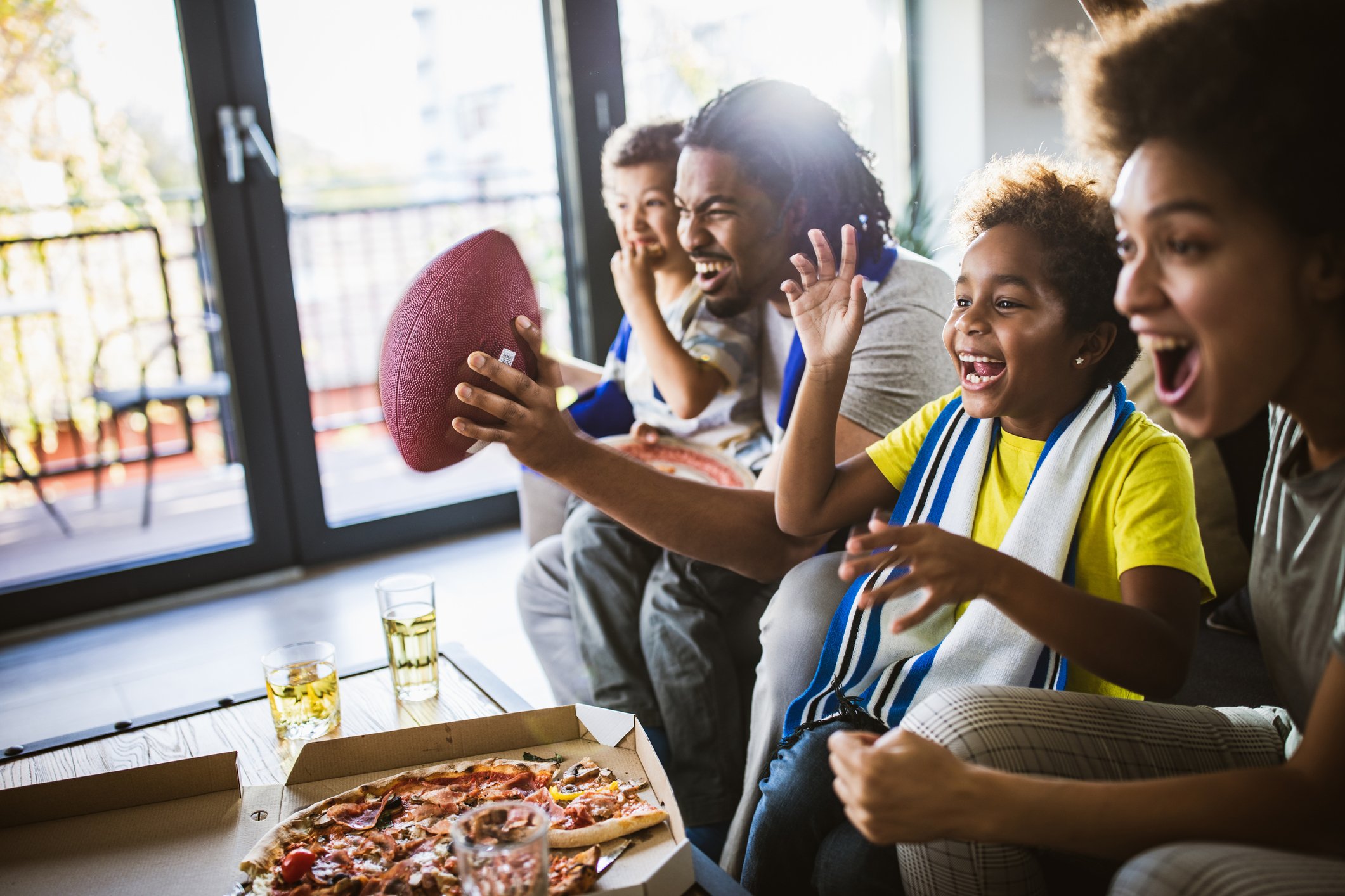 A family watching football