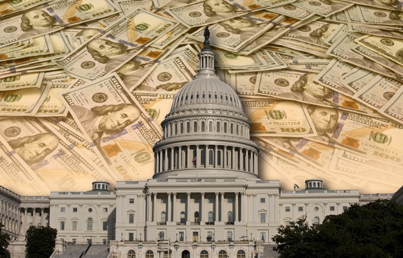 The U.S. Capitol building against a backdrop of cash.