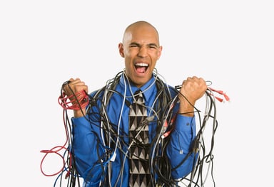 Network cable mess angry businessman